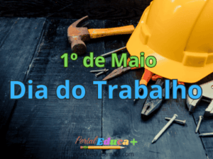 Capacete de segurança amarelo e ferramentas sobre uma superfície de madeira, com o texto “1º de Maio – Dia do Trabalho”